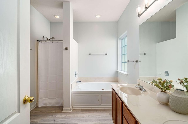 77 Kendall Park Dr, Nashville, TN 37217 - full bathroom featuring a garden tub, wood finished floors, double vanity, and a shower with curtain
