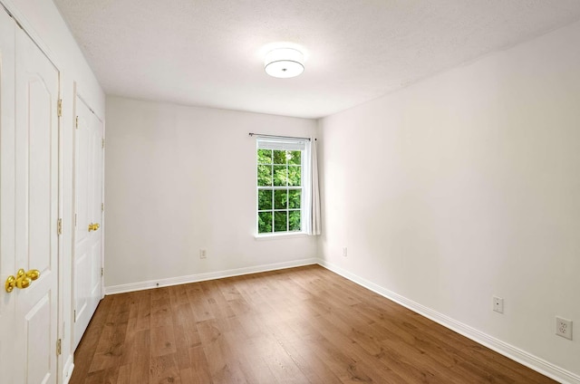 77 Kendall Park Dr, Nashville, TN 37217 - unfurnished bedroom featuring wood finished floors and a textured ceiling