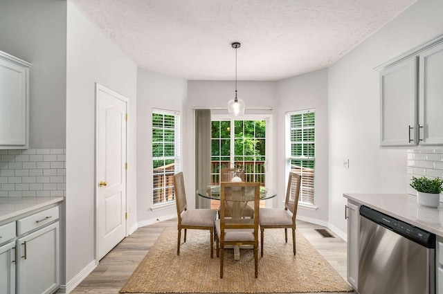 77 Kendall Park Dr, Nashville, TN 37217 - dining area with light wood-style flooring and a textured ceiling