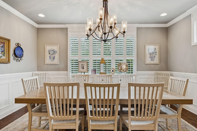 1120 Pretender Way, Columbia, TN 38401 - dining area featuring a chandelier, a decorative wall, ornamental molding, wood finished floors, and plenty of natural light