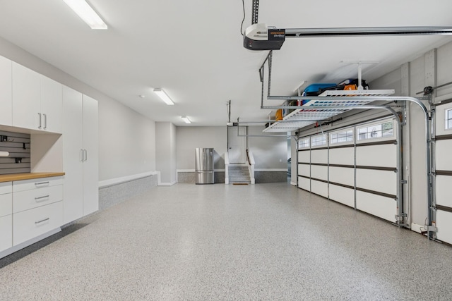 1120 Pretender Way, Columbia, TN 38401 - garage featuring a garage door opener