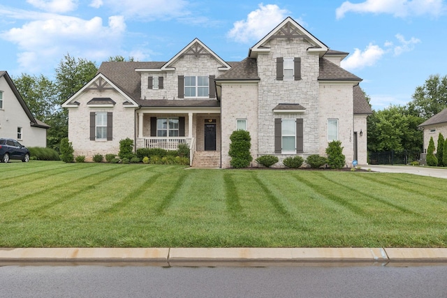 1120 Pretender Way, Columbia, TN 38401 - view of front facade featuring covered porch, a front yard, and roof with shingles