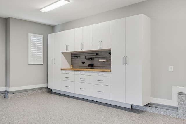 1120 Pretender Way, Columbia, TN 38401 - kitchen featuring speckled floor, white cabinetry, and butcher block counters