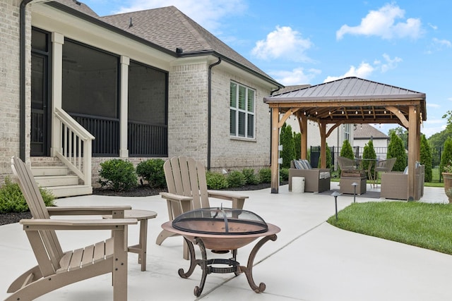 1120 Pretender Way, Columbia, TN 38401 - view of patio / terrace with a gazebo, a fire pit, entry steps, and a sunroom