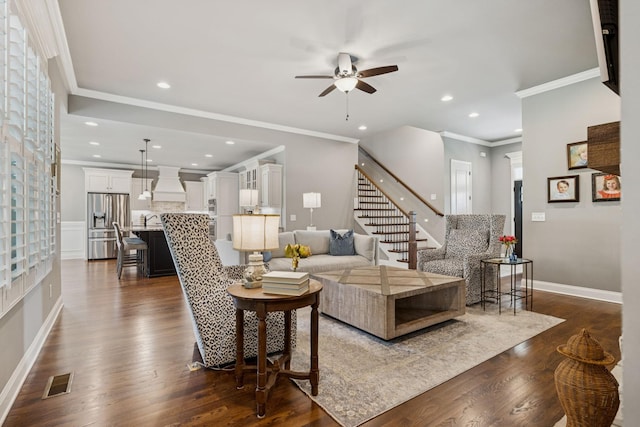 1120 Pretender Way, Columbia, TN 38401 - living area featuring a ceiling fan, dark wood finished floors, ornamental molding, recessed lighting, and stairs