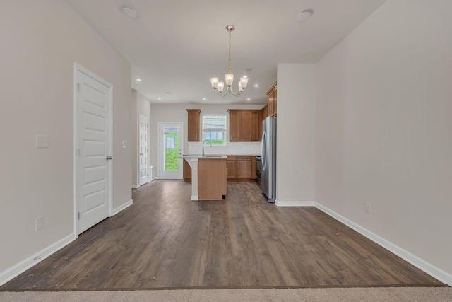 5211 Gladecress Ln, Hermitage, TN 37076 - kitchen featuring freestanding refrigerator, a chandelier, a kitchen island, light countertops, and recessed lighting