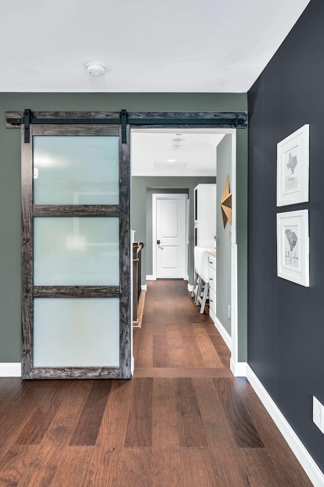 1229 Bobwhite Trl, Nolensville, TN 37135 - hall with a barn door and dark wood-style flooring