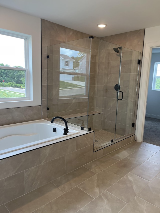 1559 Oak Springs Dr, Columbia, TN 38401 - bathroom with tile patterned floors, a garden tub, and a shower stall