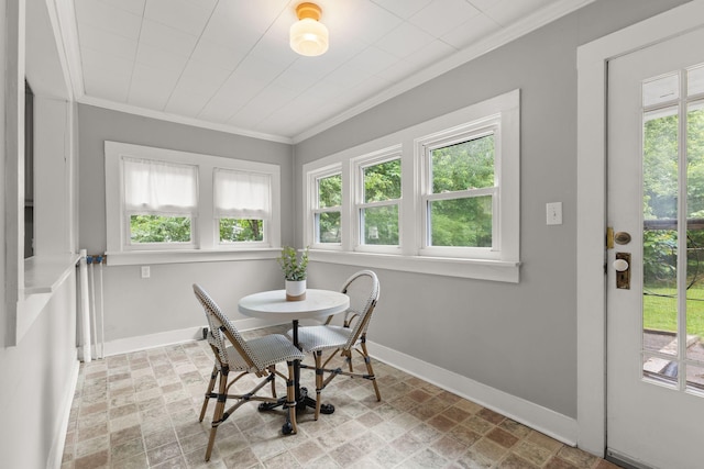 104 S Charlotte St, Dickson, TN 37055 - dining room with ornamental molding and plenty of natural light