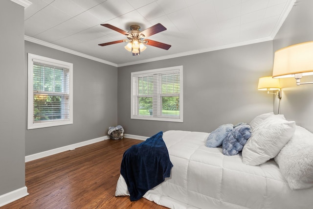 104 S Charlotte St, Dickson, TN 37055 - bedroom featuring multiple windows, wood finished floors, crown molding, and a ceiling fan