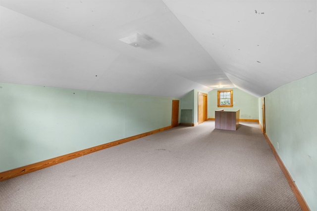 104 S Charlotte St, Dickson, TN 37055 - additional living space featuring vaulted ceiling and light colored carpet