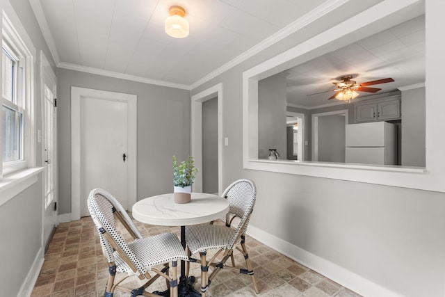 104 S Charlotte St, Dickson, TN 37055 - dining area with a ceiling fan and ornamental molding