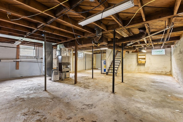104 S Charlotte St, Dickson, TN 37055 - basement featuring stairs and heating unit
