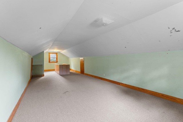 104 S Charlotte St, Dickson, TN 37055 - additional living space with vaulted ceiling and light colored carpet