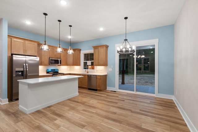 4100 Asbury Rd, Manchester, TN 37355 - kitchen featuring stainless steel appliances, a chandelier, light countertops, light wood finished floors, and recessed lighting