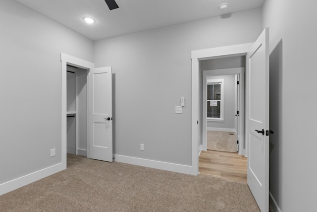 4100 Asbury Rd, Manchester, TN 37355 - unfurnished bedroom with light carpet, ceiling fan, and recessed lighting