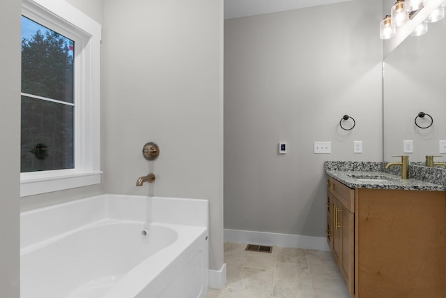 4100 Asbury Rd, Manchester, TN 37355 - full bath featuring vanity, a garden tub, and tile patterned floors
