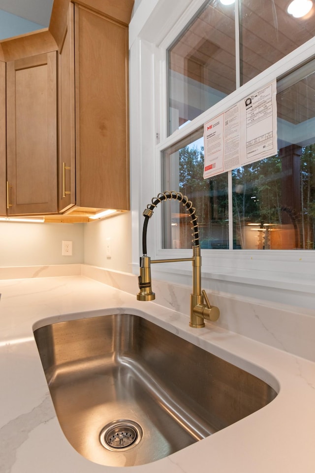 4100 Asbury Rd, Manchester, TN 37355 - kitchen view of a sink and light stone counters