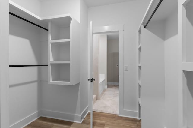 4100 Asbury Rd, Manchester, TN 37355 - spacious closet featuring wood finished floors