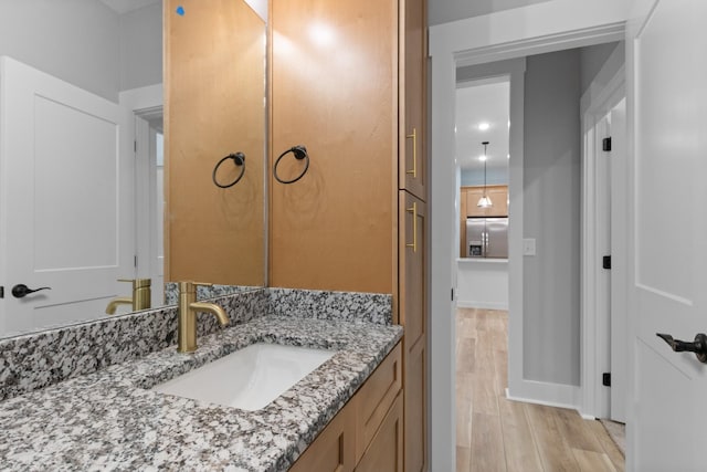 4100 Asbury Rd, Manchester, TN 37355 - bathroom with vanity and wood finished floors