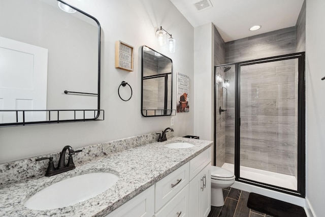 4731 Lunns Store Rd, Chapel Hill, TN 37034 - full bathroom featuring a stall shower, double vanity, and wood finished floors