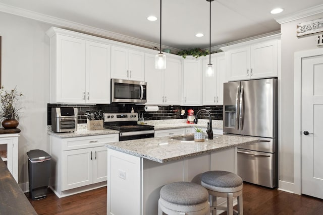4731 Lunns Store Rd, Chapel Hill, TN 37034 - kitchen with appliances with stainless steel finishes, crown molding, backsplash, dark wood-type flooring, and white cabinetry