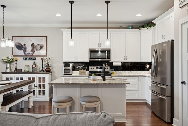 4731 Lunns Store Rd, Chapel Hill, TN 37034 - kitchen featuring appliances with stainless steel finishes, ornamental molding, decorative backsplash, white cabinets, and dark wood-type flooring