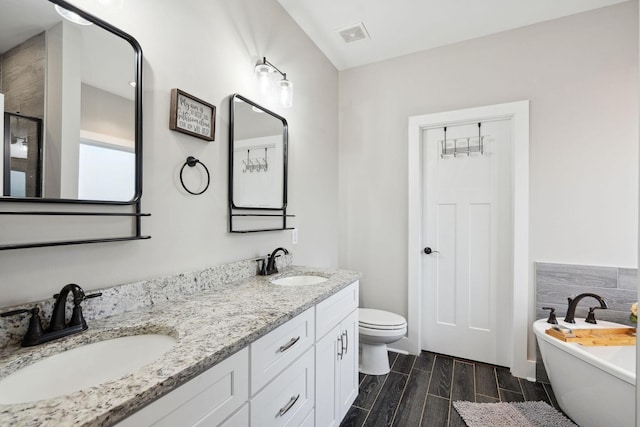 4731 Lunns Store Rd, Chapel Hill, TN 37034 - full bathroom featuring a soaking tub, double vanity, a shower with shower door, and wood tiled floors
