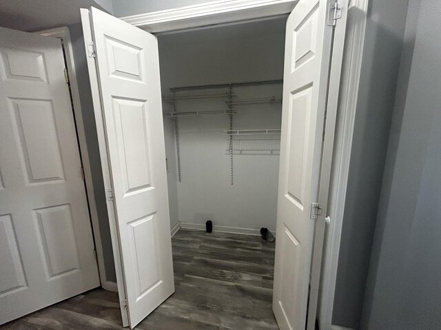 7206 Rosemary Ct, Fairview, TN 37062 - laundry area featuring dark wood-type flooring and baseboards