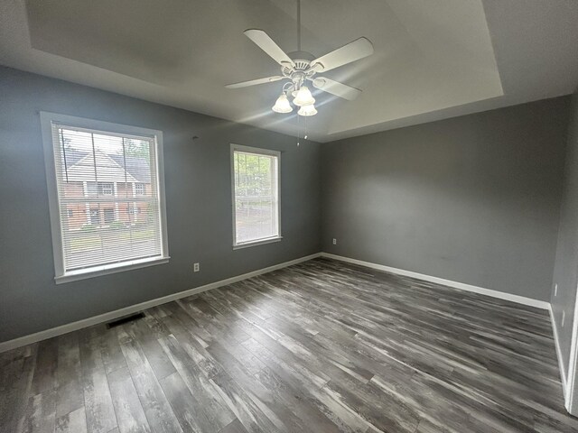 7206 Rosemary Ct, Fairview, TN 37062 - spare room featuring ceiling fan, wood finished floors, and a tray ceiling