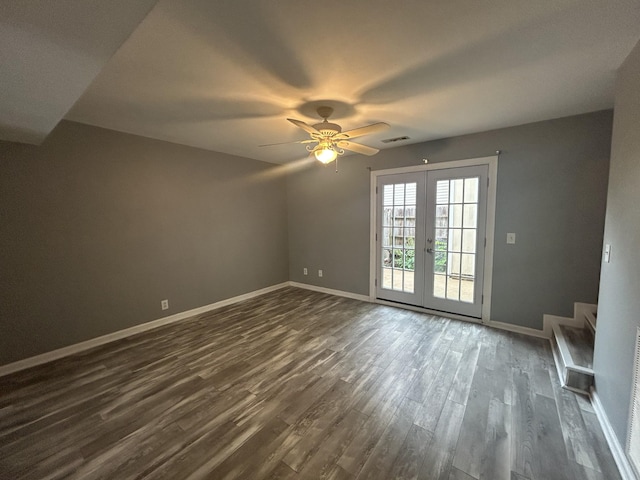 7206 Rosemary Ct, Fairview, TN 37062 - spare room featuring french doors, dark wood-style floors, a ceiling fan, and stairway