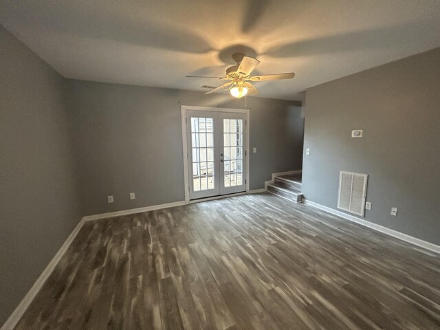 7206 Rosemary Ct, Fairview, TN 37062 - spare room featuring dark wood-type flooring, ceiling fan, and french doors
