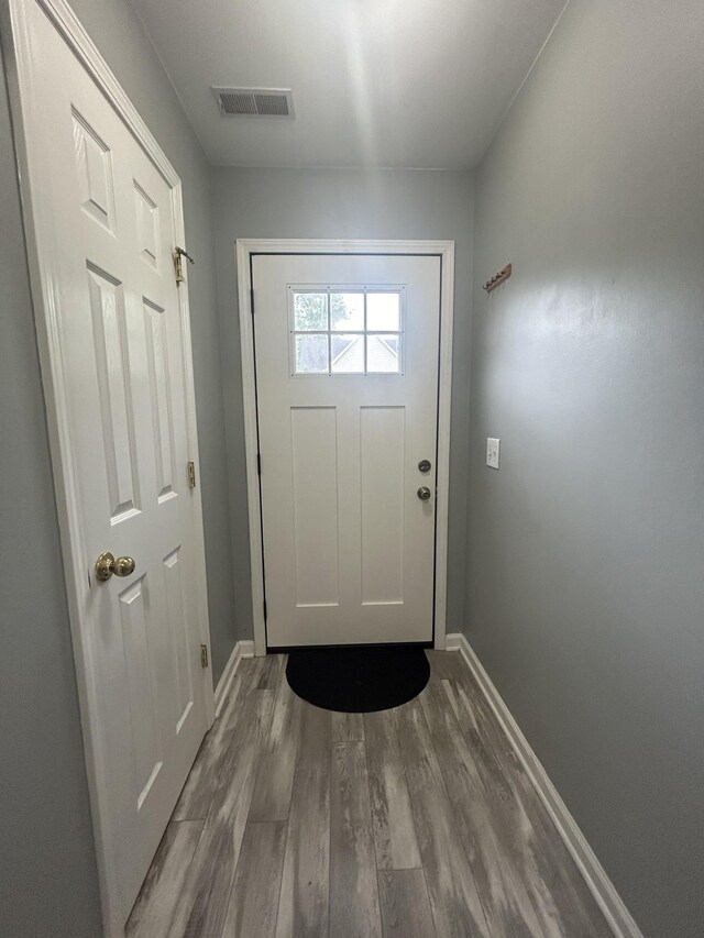 7206 Rosemary Ct, Fairview, TN 37062 - doorway featuring wood finished floors and baseboards