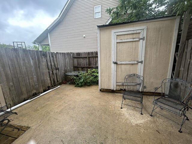 7206 Rosemary Ct, Fairview, TN 37062 - view of patio featuring a storage unit