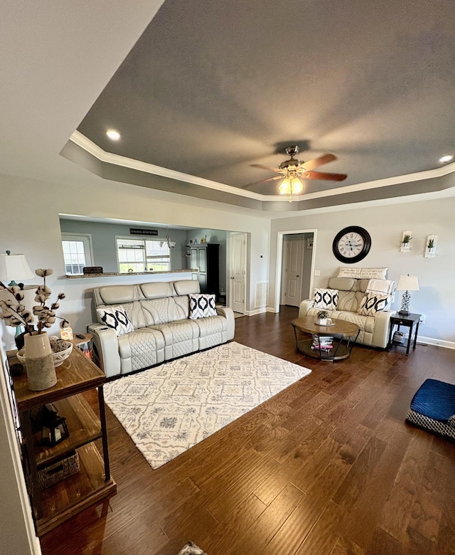 4611 Turquoise Ln, Murfreesboro, TN 37129 - living room featuring a tray ceiling, a ceiling fan, wood finished floors, ornamental molding, and recessed lighting
