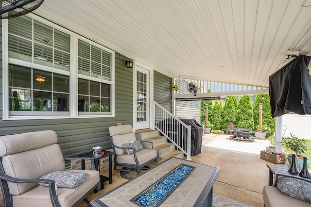 4611 Turquoise Ln, Murfreesboro, TN 37129 - view of patio with an outdoor living space with a fire pit and entry steps