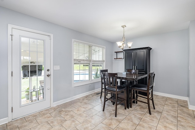 4611 Turquoise Ln, Murfreesboro, TN 37129 - dining area featuring a chandelier and light tile patterned flooring