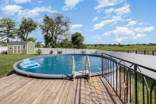 4611 Turquoise Ln, Murfreesboro, TN 37129 - view of swimming pool featuring a fenced backyard, a storage shed, and a deck