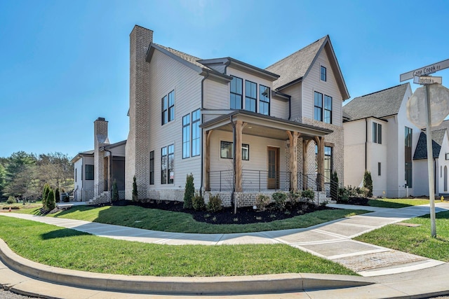 8011 Cane Creek Rd, Nashville, TN 37221 - view of front facade with covered porch, a chimney, and a front yard