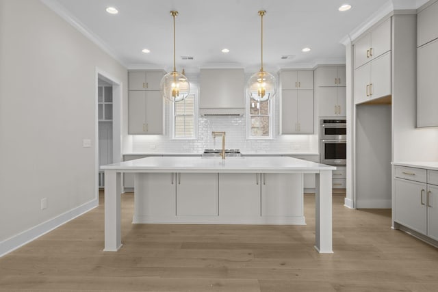 8011 Cane Creek Rd, Nashville, TN 37221 - kitchen with premium range hood, backsplash, crown molding, light countertops, and recessed lighting