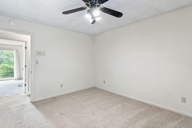 123 Proffitt St, Carthage, TN 37030 - carpeted spare room with a ceiling fan, a textured ceiling, and a smoke detector