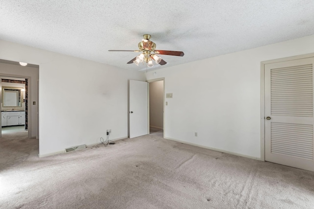123 Proffitt St, Carthage, TN 37030 - unfurnished bedroom with carpet flooring, ceiling fan, and a textured ceiling