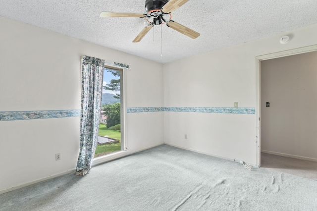 123 Proffitt St, Carthage, TN 37030 - carpeted spare room featuring a textured ceiling, ceiling fan, and a smoke detector