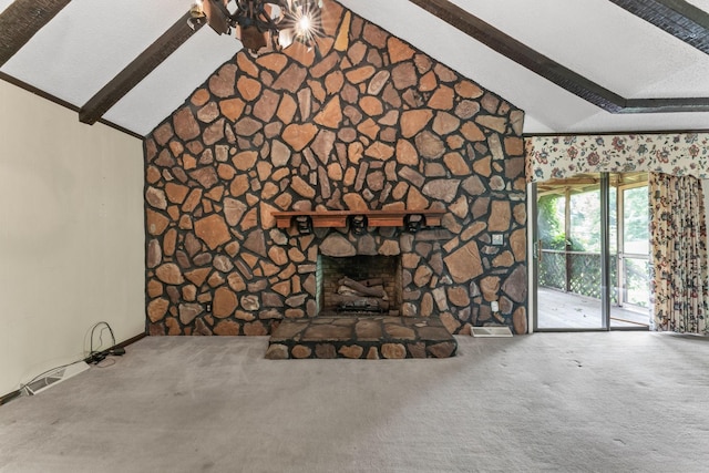 123 Proffitt St, Carthage, TN 37030 - unfurnished living room with vaulted ceiling, carpet flooring, and a stone fireplace