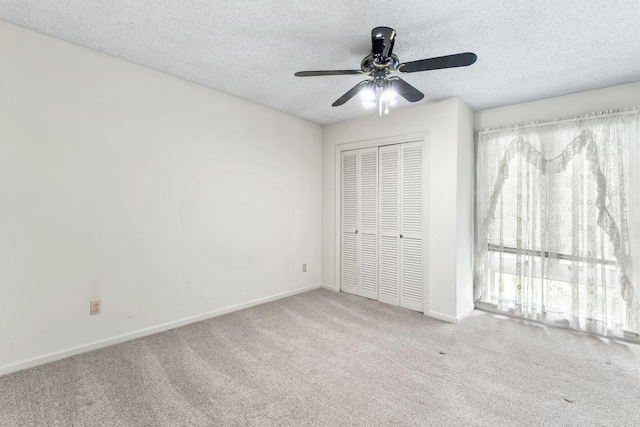 123 Proffitt St, Carthage, TN 37030 - unfurnished bedroom with carpet flooring, a textured ceiling, a closet, and ceiling fan