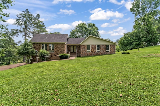 123 Proffitt St, Carthage, TN 37030 - view of front of home with a front lawn and brick siding