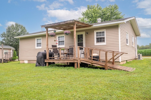 502 N Main St, Loretto, TN 38469 - back of property featuring a lawn, a wooden deck, and crawl space