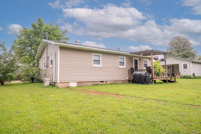 502 N Main St, Loretto, TN 38469 - back of property with a wooden deck, a yard, and crawl space