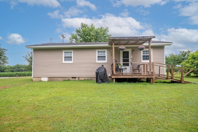 502 N Main St, Loretto, TN 38469 - rear view of house featuring a wooden deck, a yard, a pergola, and crawl space