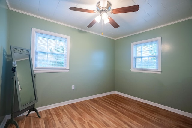 502 N Main St, Loretto, TN 38469 - spare room featuring wood finished floors, ceiling fan, and crown molding